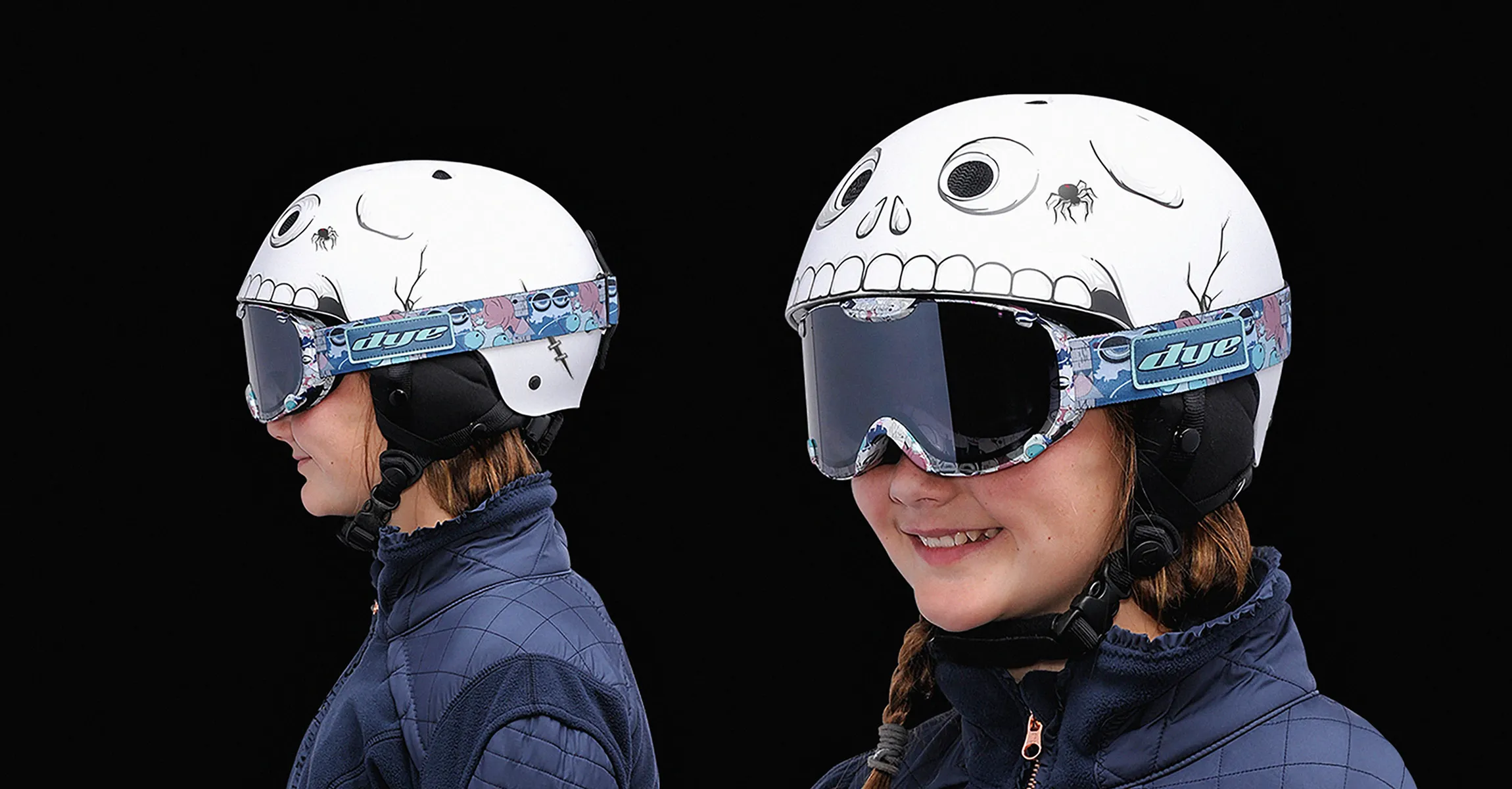 Two riders wearing the skull graphic helmet with DYE goggles